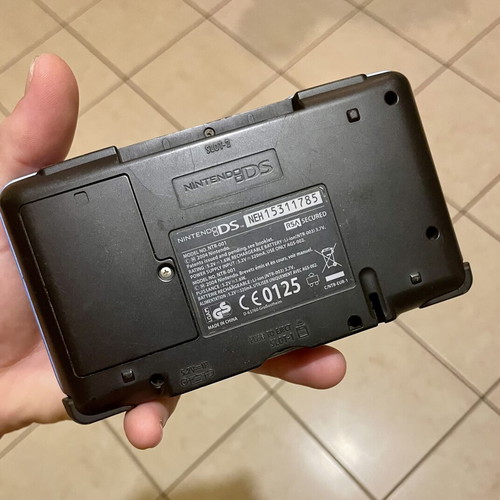 Nintendo DS Fat console with charger and stylus