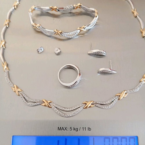 Fa Cad'oro jewelry set like new, gold and white gold with zircon stones