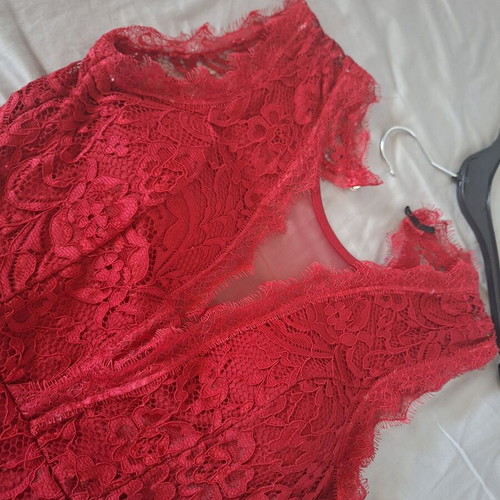 Red embroidered dress with chest transparency and open back, like new