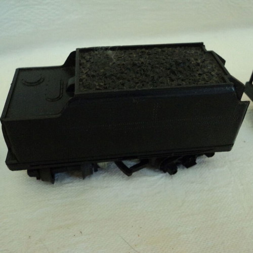 Train set used, engine with three wagons and tracks made in Japan