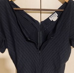 Vogue black elastic blouse with V-neck and zipper