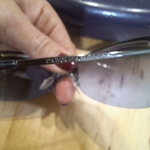 Carolina Herrera vintage women's sunglasses used, purple butterfly design