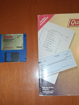 Quicken Program Disk and User's Manual used for Apple IIGS, IIc, IIc Plus, IIe