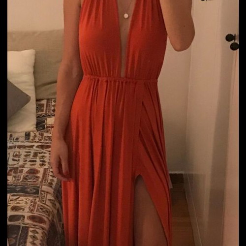 Nash dress one size new, orange with deep V and side slits