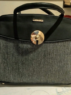 Privata shoulder bag like new, black with silver highlights