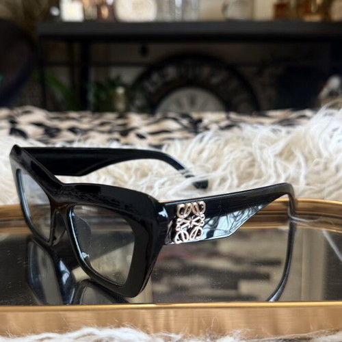 Cat Eye Sunglasses black like new with metal logo