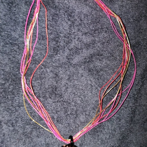 Handmade pendant new with colorful cords and silver clasp