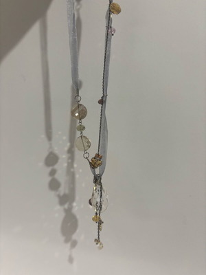 Necklace with ribbon and beads in like new condition, white