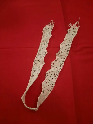 Knitted lace like new, 60 cm by 4 cm