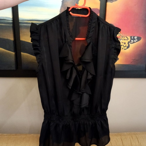 Black satin blouse like new with neckline opening, sizes L/XL