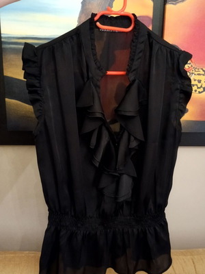 Black satin blouse like new with neckline opening, sizes L/XL