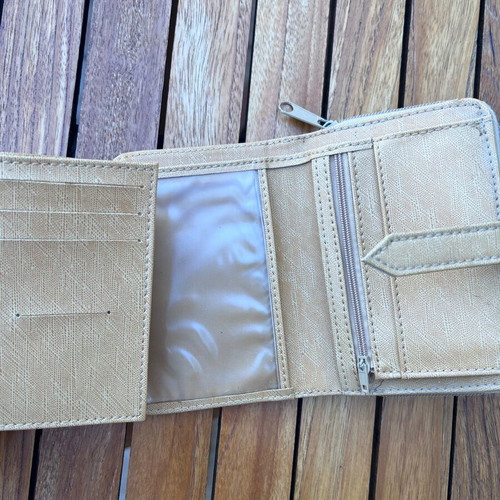 Wallet used, beige with multiple card slots