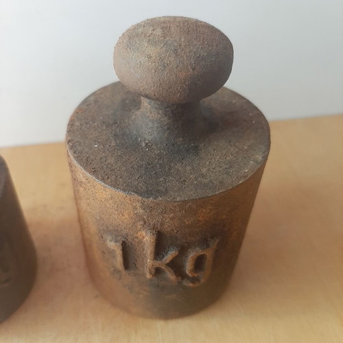 Cast iron weights used, set of 1 kg and 0.5 kg
