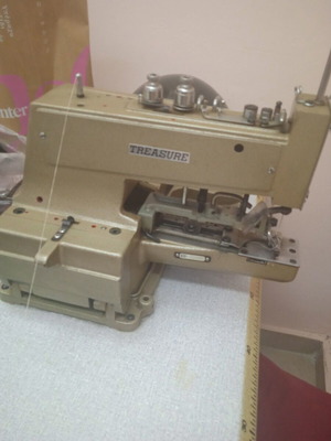 Industrial sewing machines used, including Treasure button machine and cutters