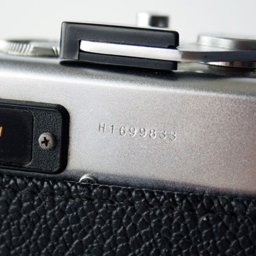 Yashica Electro 35 camera used with flash and case