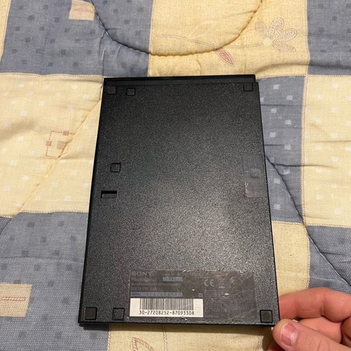 PlayStation 2 Slim used, functional without power cable