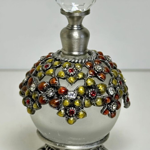 Vintage glass perfume bottle with floral enamel decoration