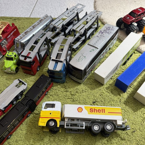 Large collection of toy trucks with accessories