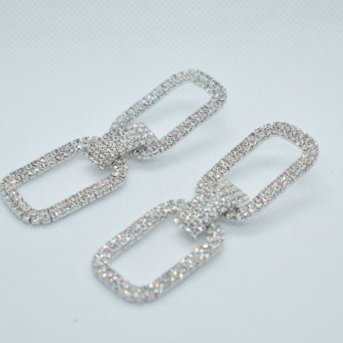 Earrings in silver color with gliter new