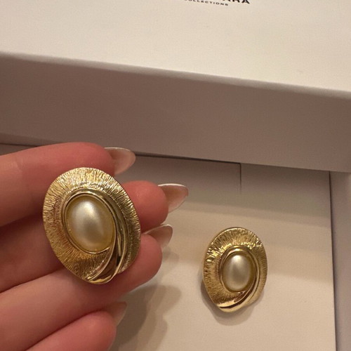 Clips earrings new without box