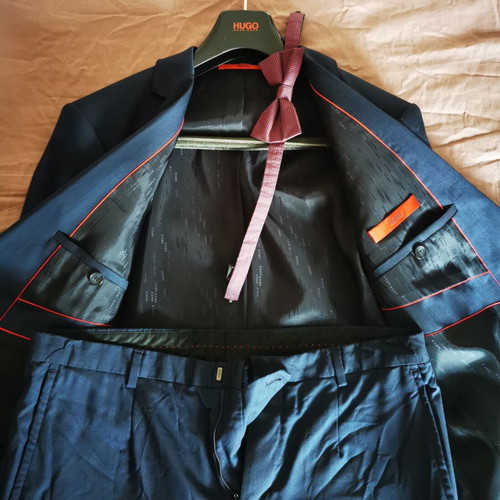 Hugo Boss blue suit with bow tie like new