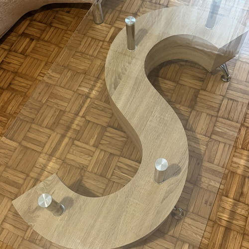 Coffee table with natural wood and glass top