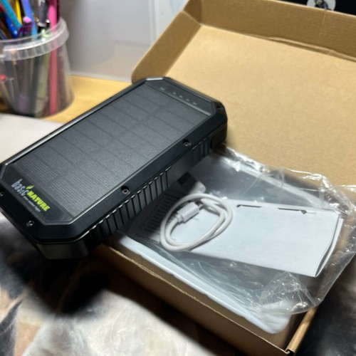 Solar Powerbank BasicNature 20,000mAh like new with wireless charging and LED flashlight