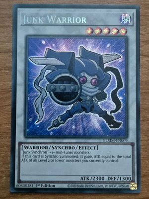 Junk Warrior BLMM Secret Rare 1η Έκδοση Near Mint