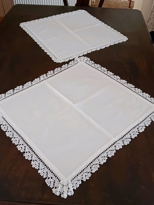 Two traditional woven table linens with handmade lace like new