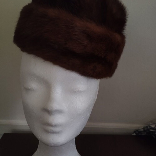 Women's hat made of authentic fur like new, brown