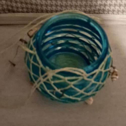 Hanging tealight candle holder with decorative shells