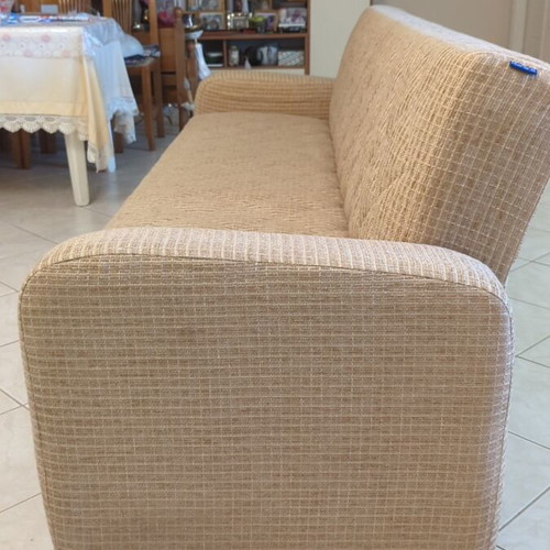 Practical three-seat sofa bed like new with storage compartments