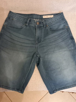 Two denim shorts like new, size medium, blue and black