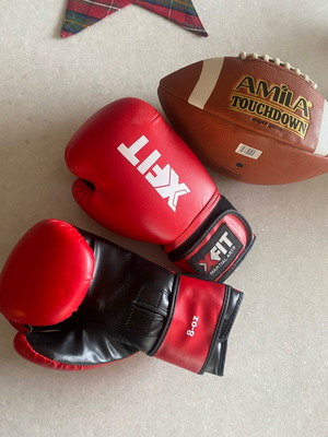 Boxing gloves and rugby ball like new