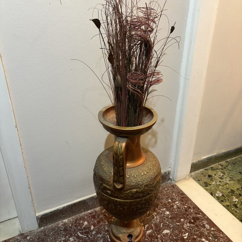 Antique amphora used with a break at the bottom