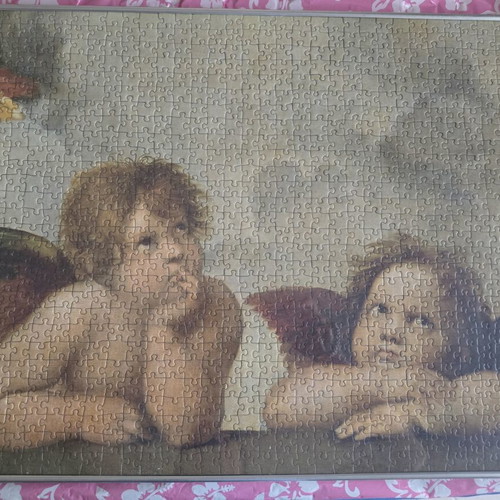 Ravensburger 1000-piece puzzle like new, 2 Cherubs