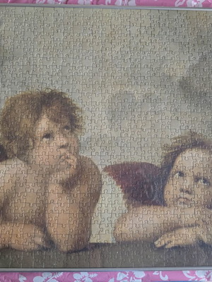 Ravensburger 1000-piece puzzle like new, 2 Cherubs