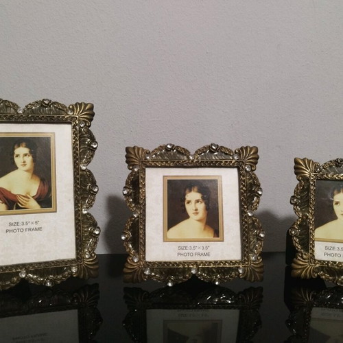 Vintage frame set like new with embossed designs and rhinestones