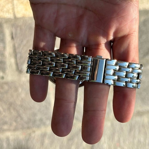 Christian D. Quartz watch with blue dial and metal bracelet