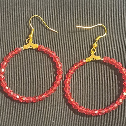 Earrings with red beads on silver hoop like new
