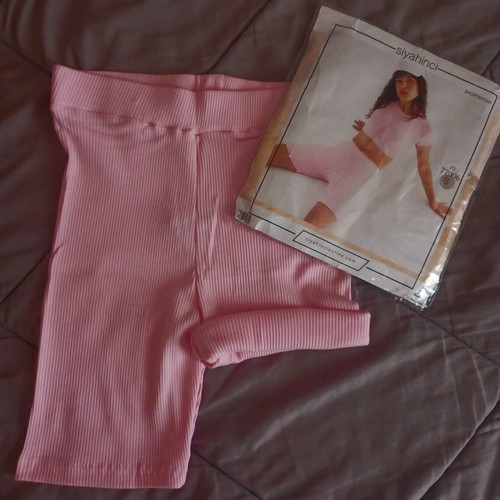 Pink shorts new with tags, elastic fit, size S