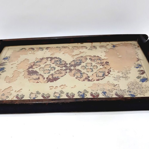 Vintage wooden tray with glass panel and painted design used