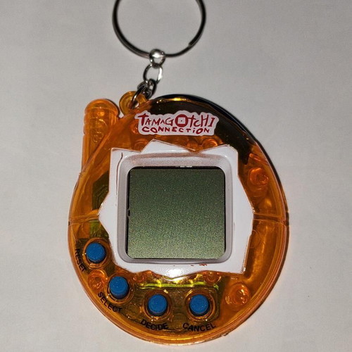 Tamagotchi Connection Orange Transparent like new