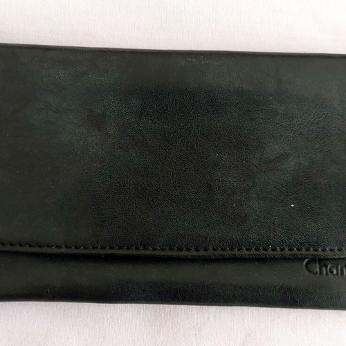 Black leather tobacco pouch used with paper holder