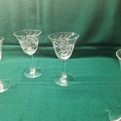 Stemmed wine glasses with engraved design, set of 5, like new