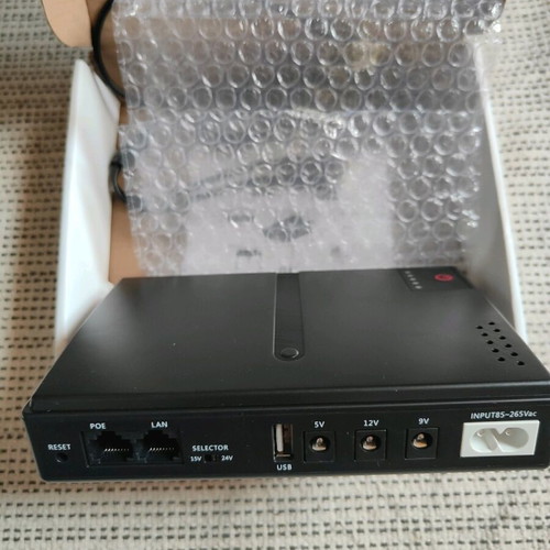Mini UPS 1018L new without batteries with multiple outputs and slot for 4 18650