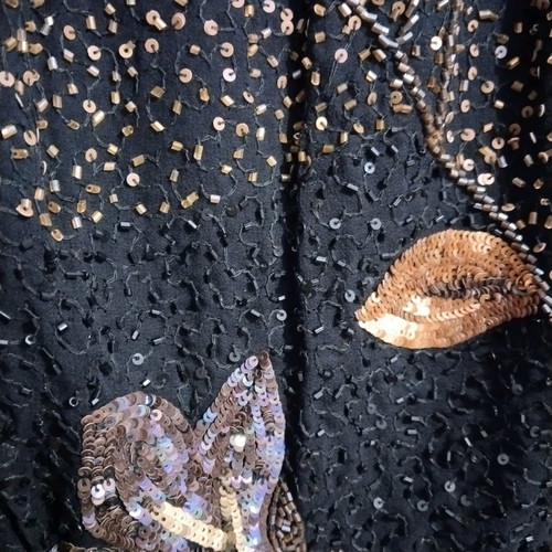 Embroidered top used, size small, black with beads and sequins