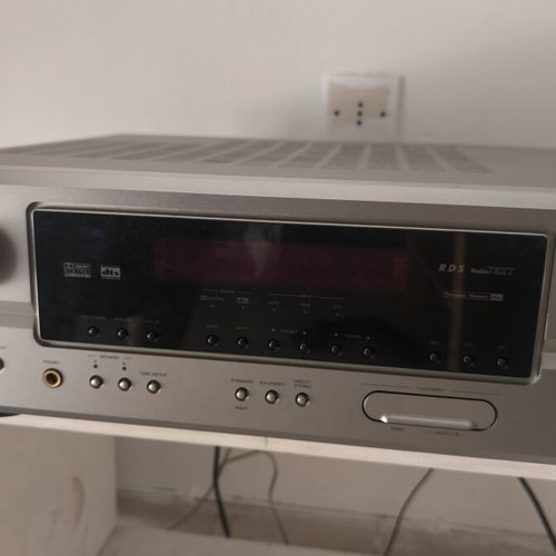 Denon AVR 1306 amplifier with subwoofer and five speakers