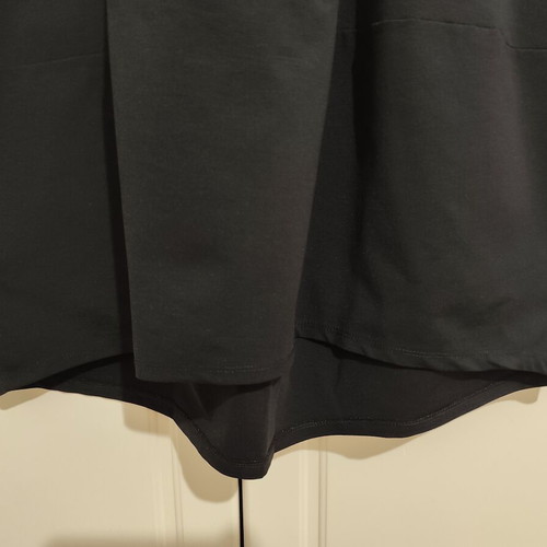 Black midi dress with pockets and asymmetrical design, one size