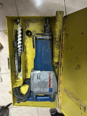 Bosch floor jackhammer used with accessories and metal case